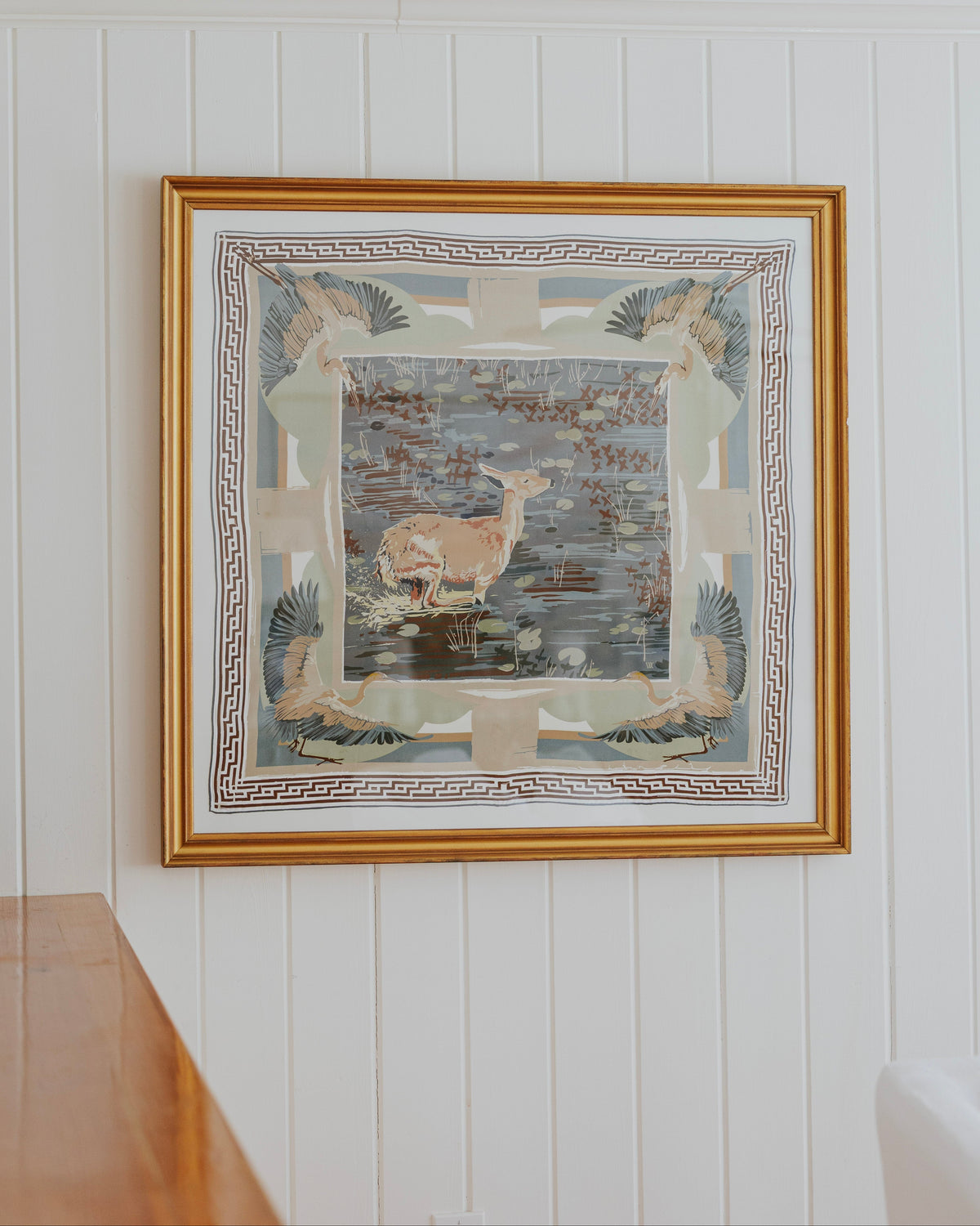 framed silk scarf with deer among lily pads and a decorative border